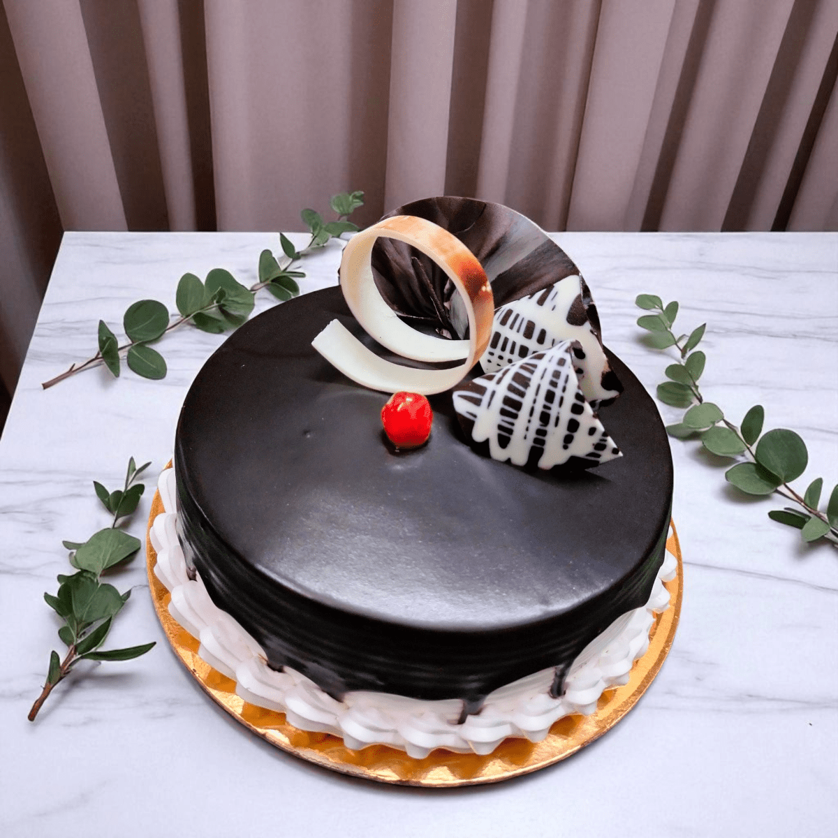 IMG-20250723-WA0003 Choco Vanilla Crown Cake with chocolate glaze, cherry, and crown garnish