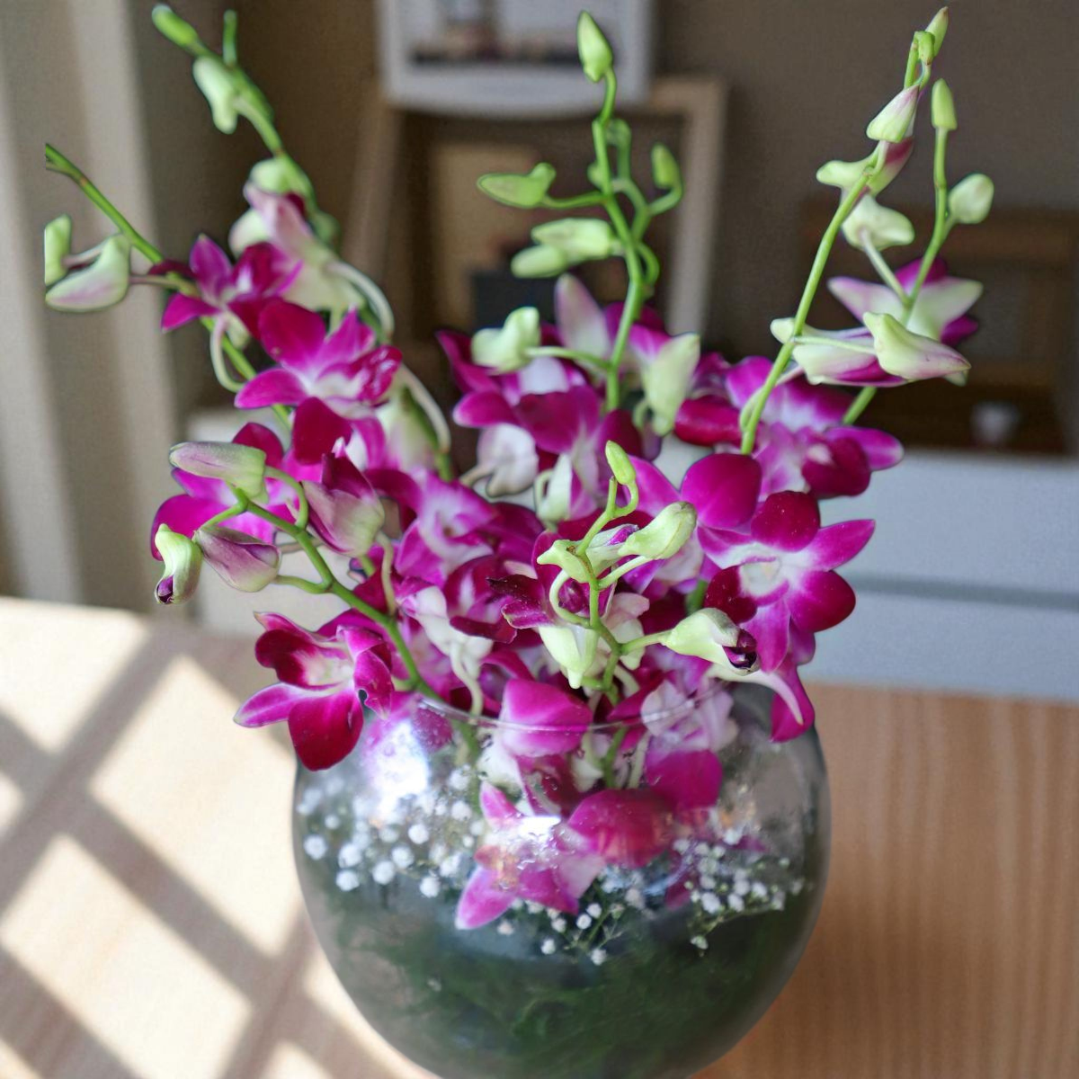 IMG_2695 (2) 8 fresh purple orchids arranged in a round glass vase with fillers