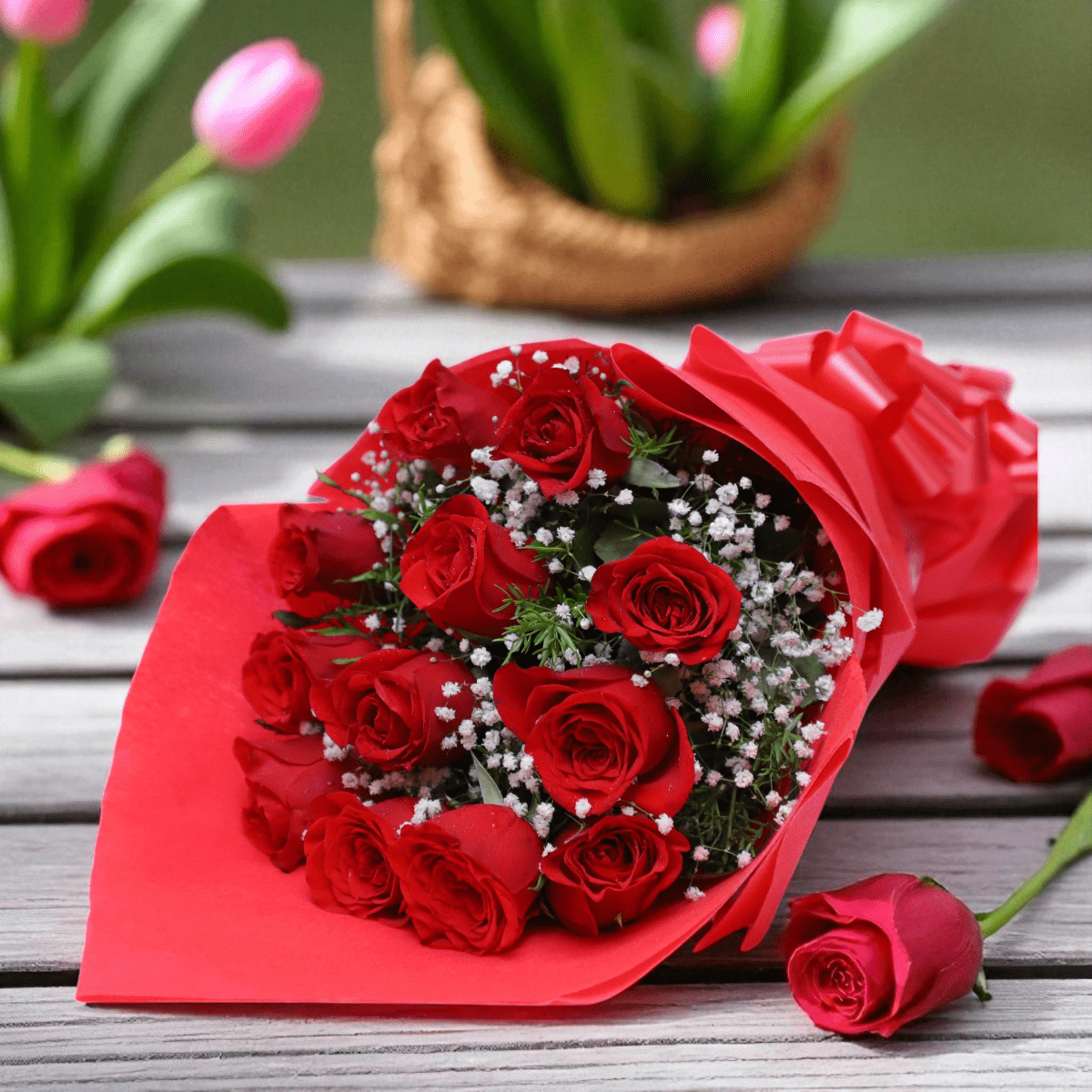 Red Rose Romance bouquet with fresh red roses, gypsy fillers, and red designer wrapping