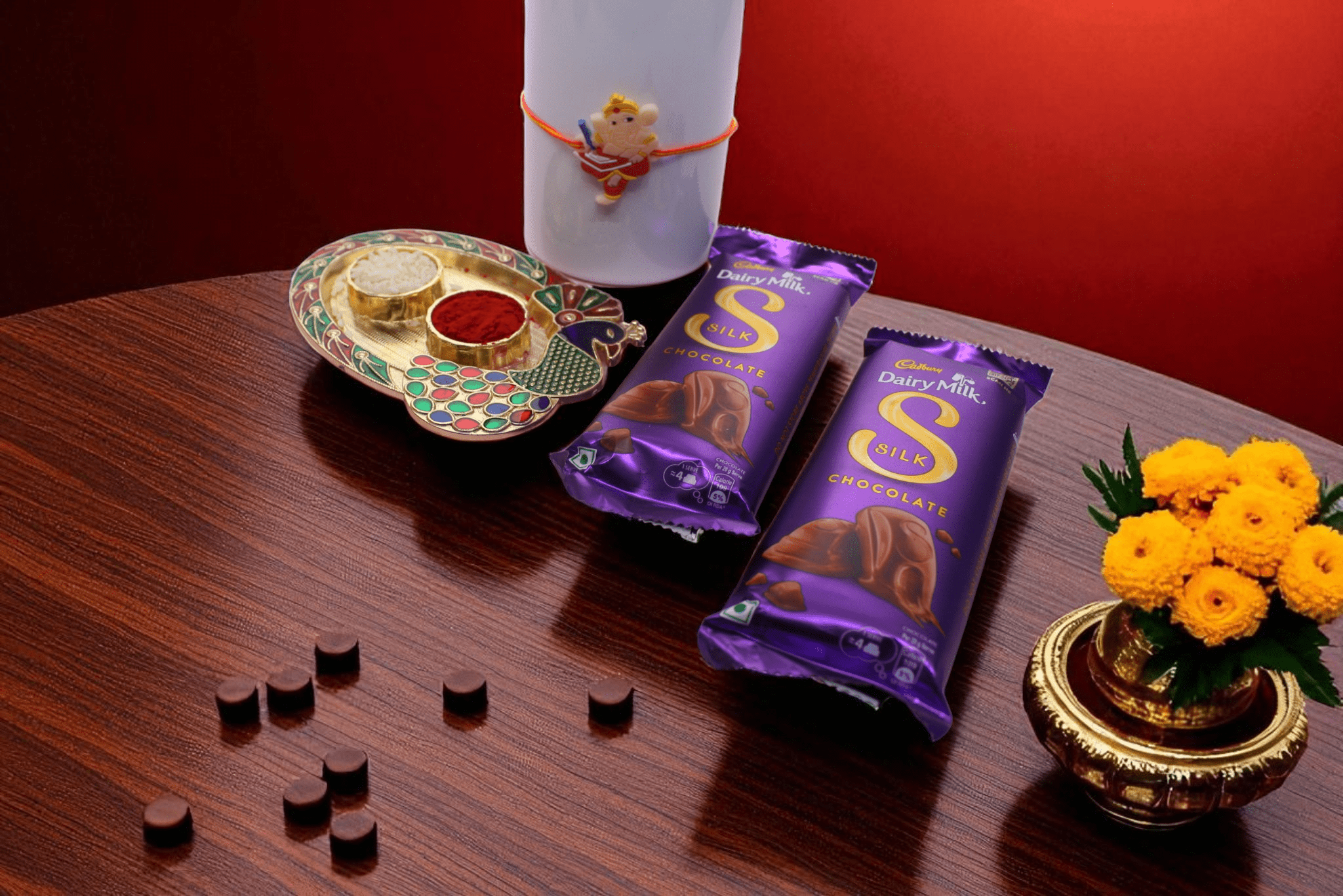 Rakhi With Chocolate Silken Delight Rakhi Surprise with Kids Rakhi, Cadbury Dairy Milk Silk Chocolates and Roli Chawal