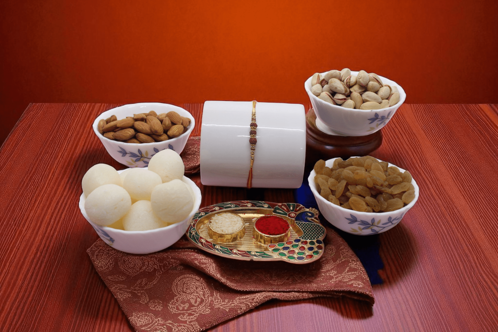 Rakhi With Sweet & Dry Fruit a divine Rudraksh Rakhi, 1kg Rasgulla pack, Dry Fruit - YHOJA.COM
