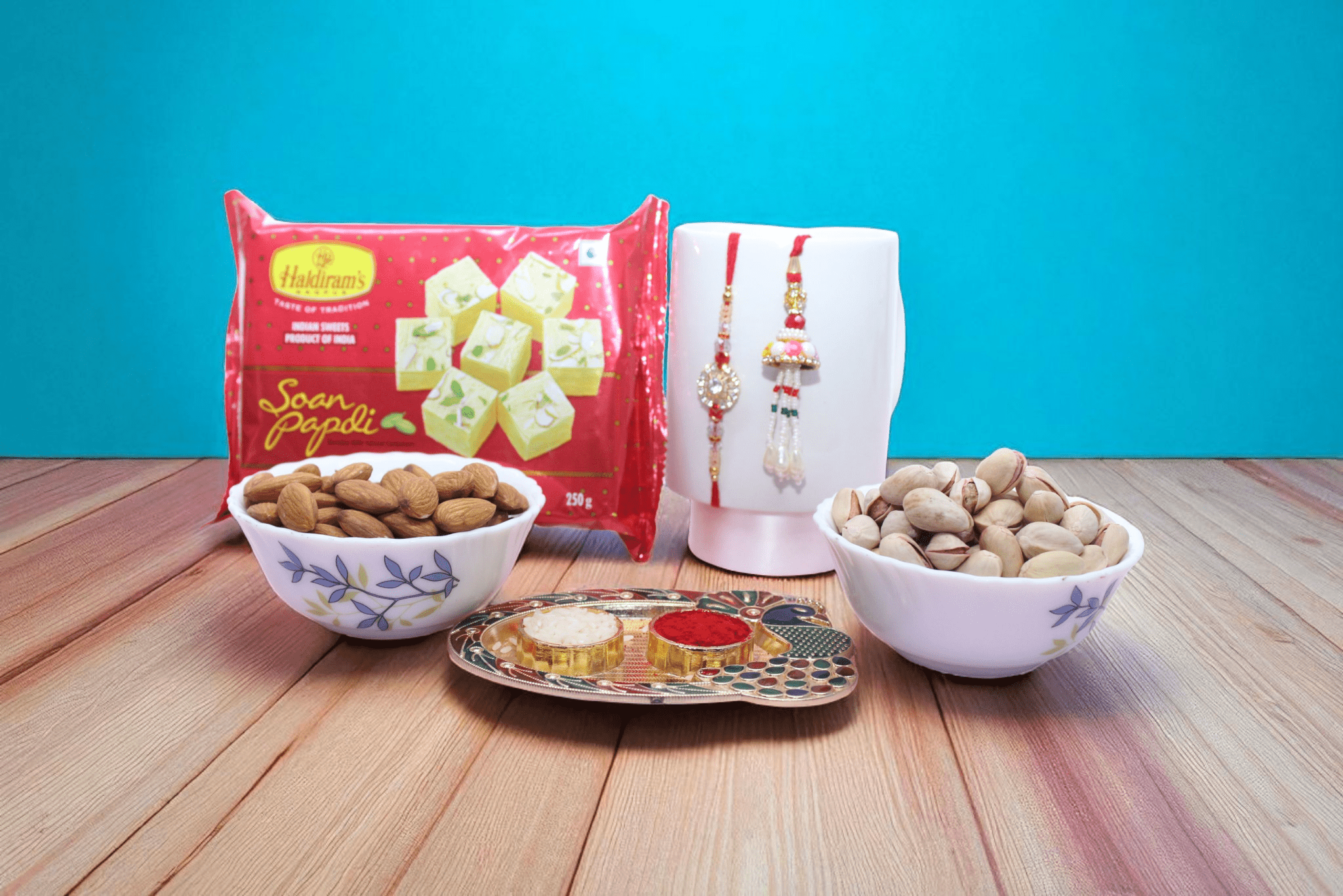 Rakhi With Sweet premium Bhaiya Bhabhi Rakhi and soan Papdi combo.