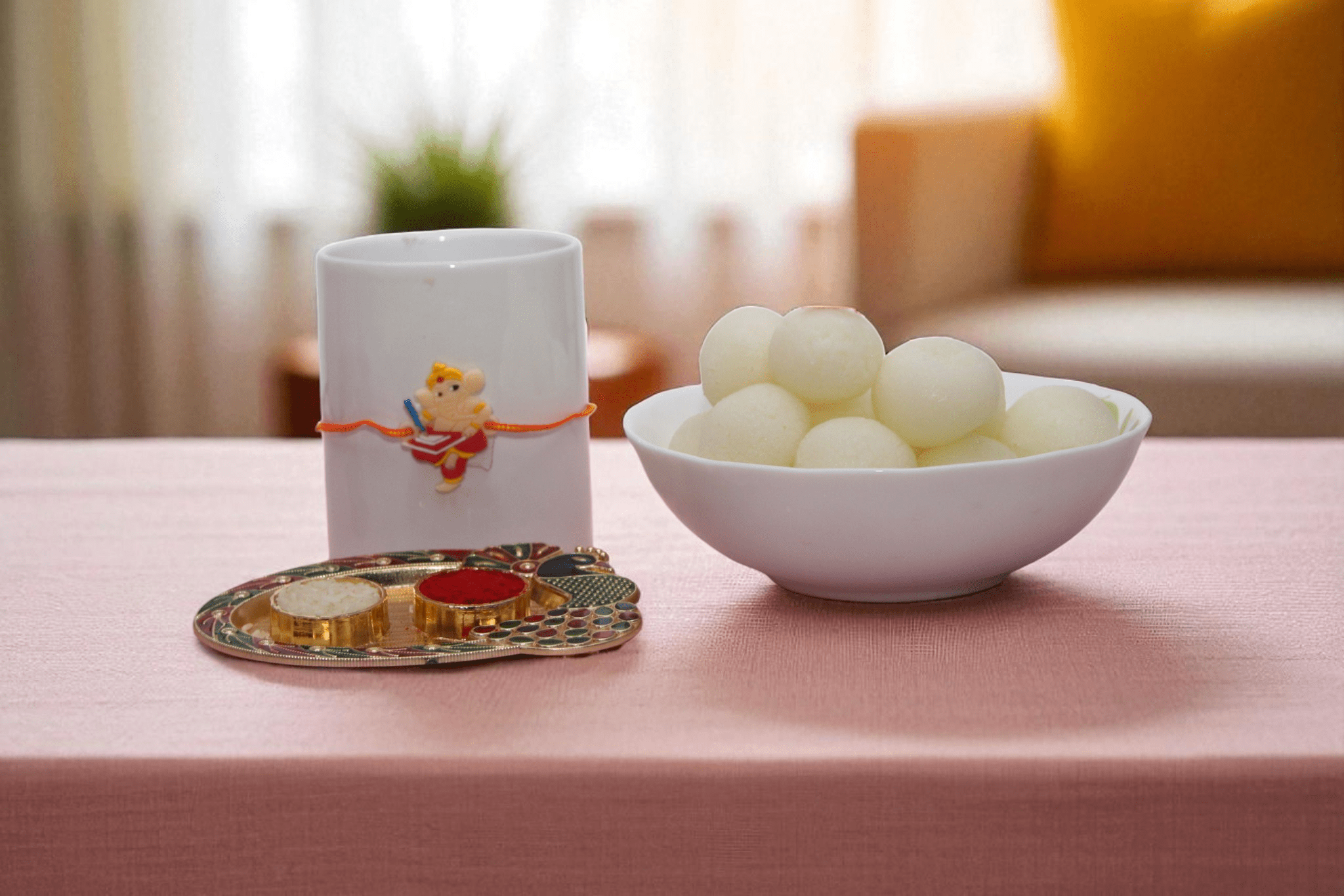 cute Ganesh-themed Kids Rakhi, this combo is paired with soft, juicy Rasgullas - Yhoja.com