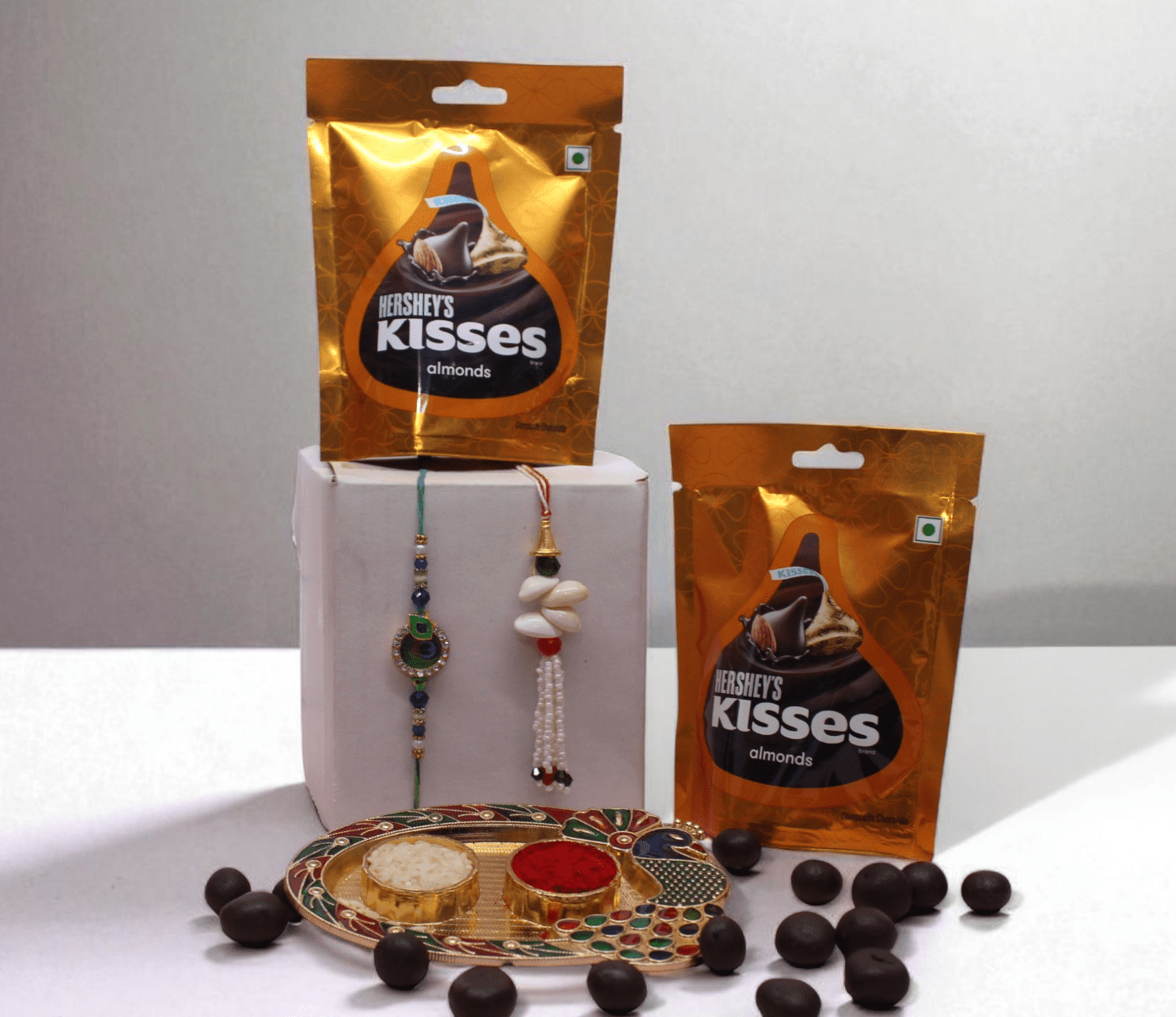 Rakhi With Chocolate Couple Rakhi Chocolate Hamper with Hershey's Kisses Almond Chocolates, Bhai Rakhi and Lumba Rakhi