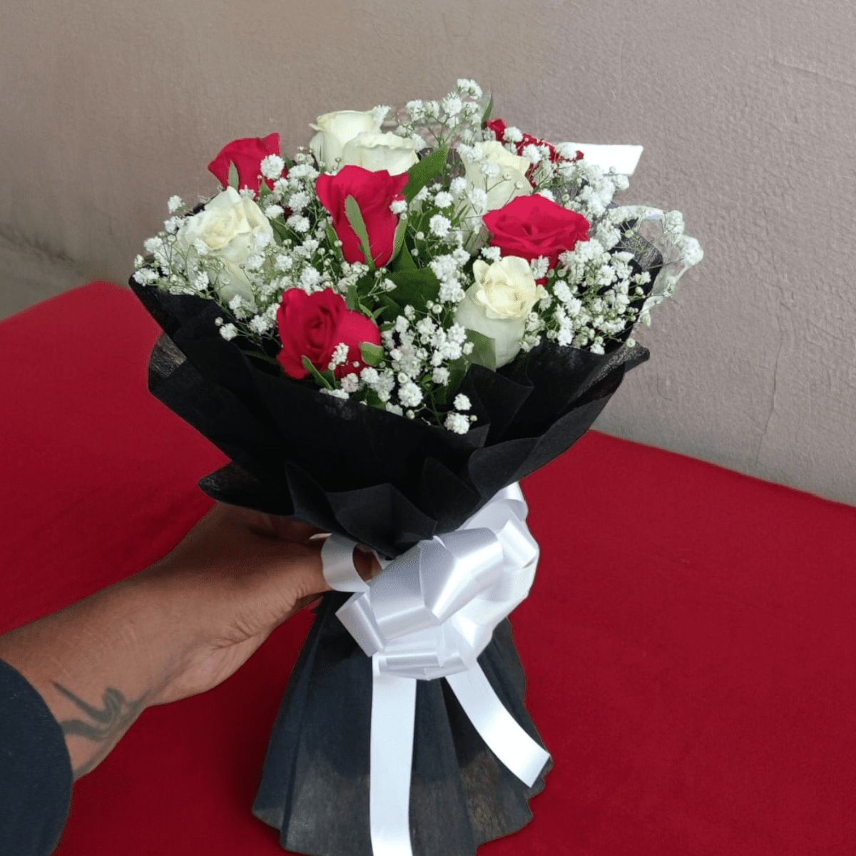 Photoroom-20240527_174247 (1) Red and white roses bouquet with baby’s breath in black wrap with white ribbon