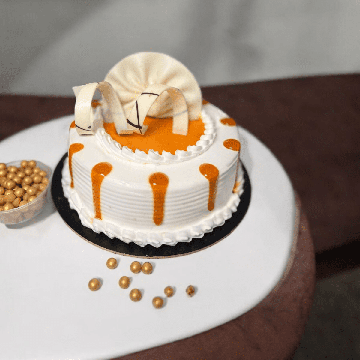 Photoroom-20250227_143830 Golden butterscotch drip cake topped with caramel glaze and white chocolate décor